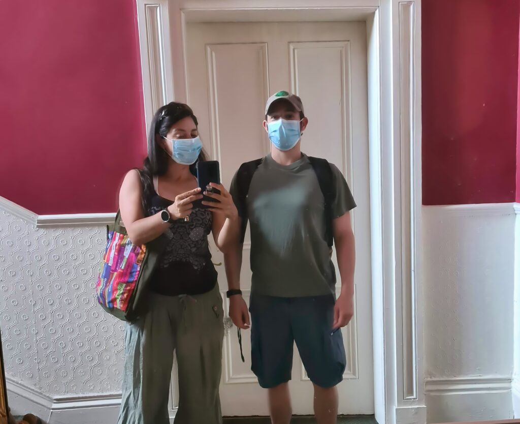 man and woman wearing masks in 2020